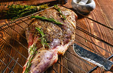 Gigot d'agneau rôti aux herbes