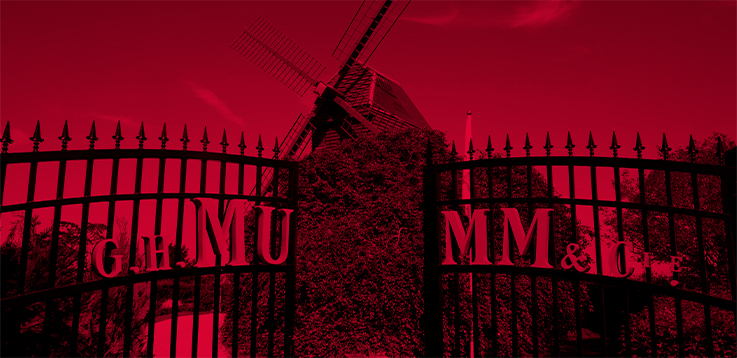 Portail de la Maison G.H.Mumm avec en arrière plan le Moulin à vent du Domaine, dans des teintes de rouge
